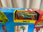 Hot Wheels Stunt Tracks Power Launch Champion Track Set and 1:64 Scale Die-Cast Toy Car